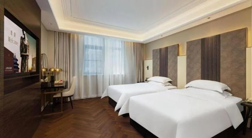 Bed in Metropolo Hotel Hefei Baohe Wandabao Park Metro Station