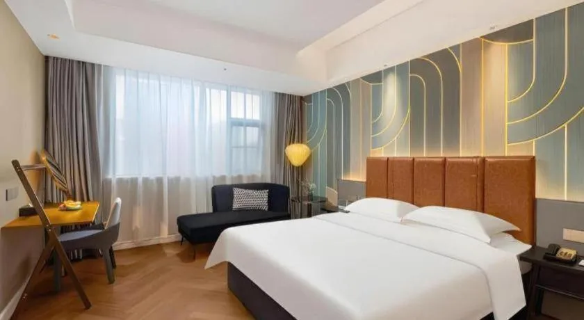 Bed in Metropolo Hotel Hefei Baohe Wandabao Park Metro Station