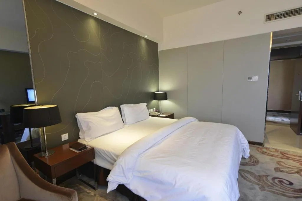 Bed in Metropolo Hotel Hefei Baohe Wandabao Park Metro Station