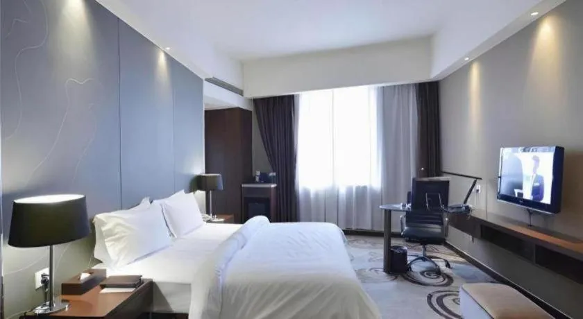 Bed in Metropolo Hotel Hefei Baohe Wandabao Park Metro Station