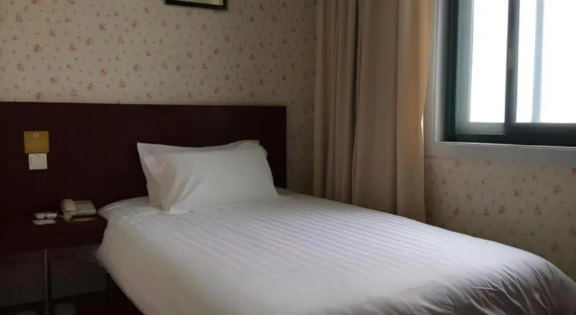 Bed in Jinjiang Inn Select Shanghai Expo Park Dezhou Road