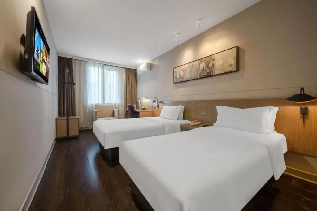 Bed in Jinjiang Inn Select Shanghai Expo Park Dezhou Road