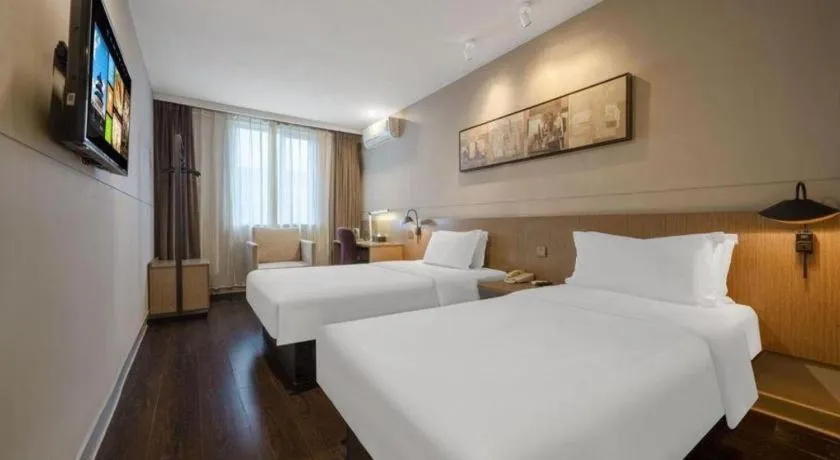 Bed in Jinjiang Inn Select Shanghai Expo Park Dezhou Road