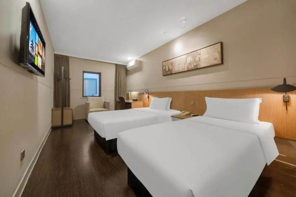 Bed in Jinjiang Inn Select Shanghai Expo Park Dezhou Road