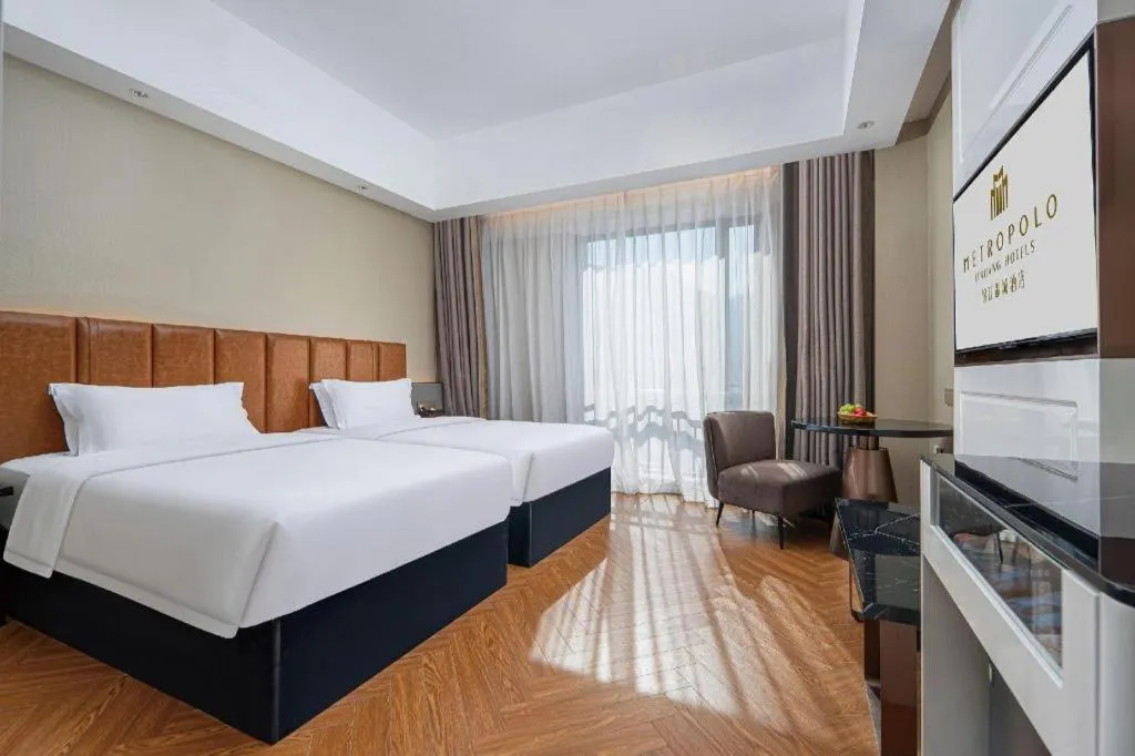 Bed in Jinjiang Metropolo Hotel - Ningde Wanda Plaza