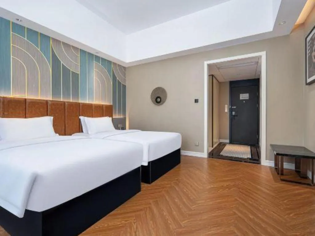 Bed in Jinjiang Metropolo Hotel - Ningde Wanda Plaza
