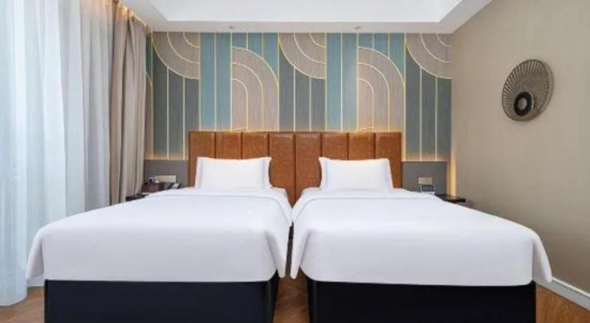 Bed in Jinjiang Metropolo Hotel - Ningde Wanda Plaza
