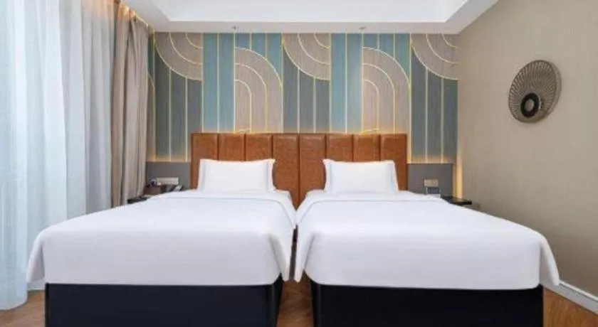 Bed in Jinjiang Metropolo Hotel - Ningde Wanda Plaza