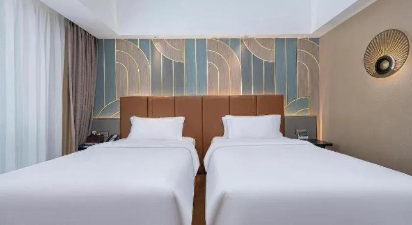 Bed in Jinjiang Metropolo Hotel - Ningde Wanda Plaza
