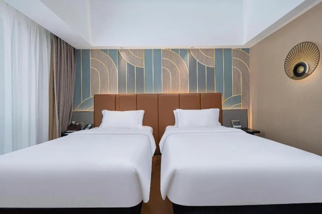 Bed in Jinjiang Metropolo Hotel - Ningde Wanda Plaza