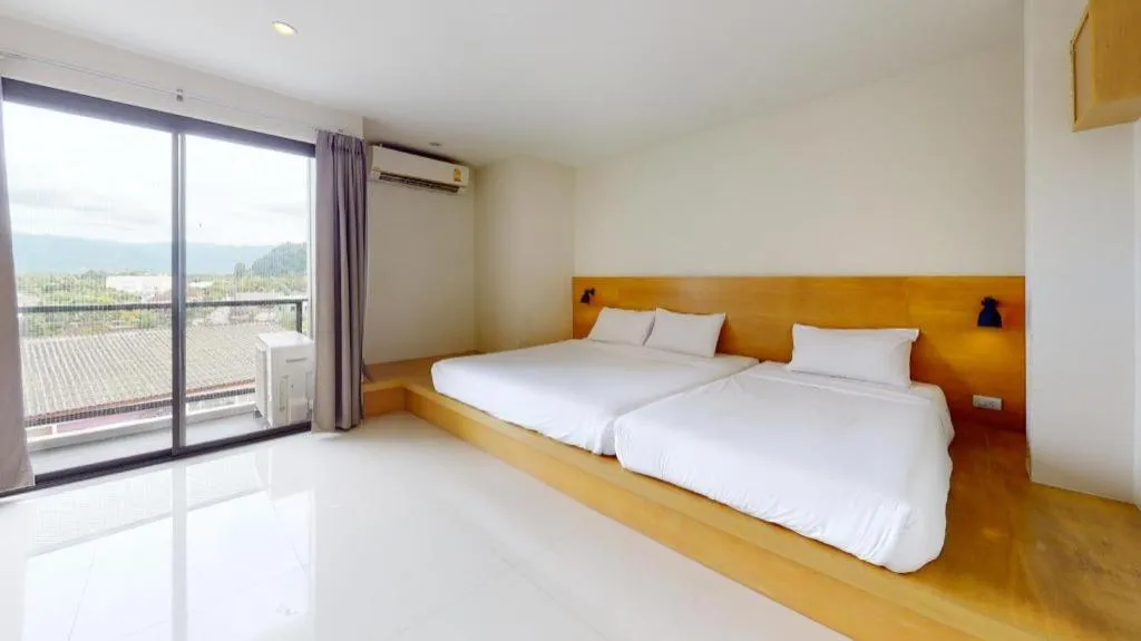 Bed in Le Park Hotel