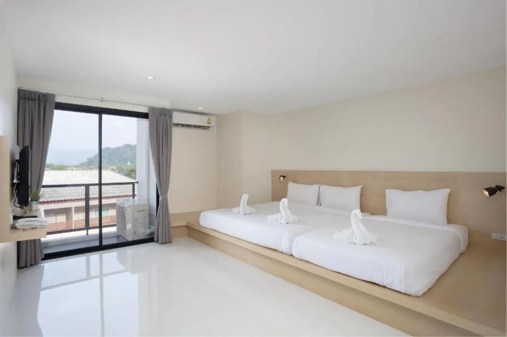 Bed in Le Park Hotel