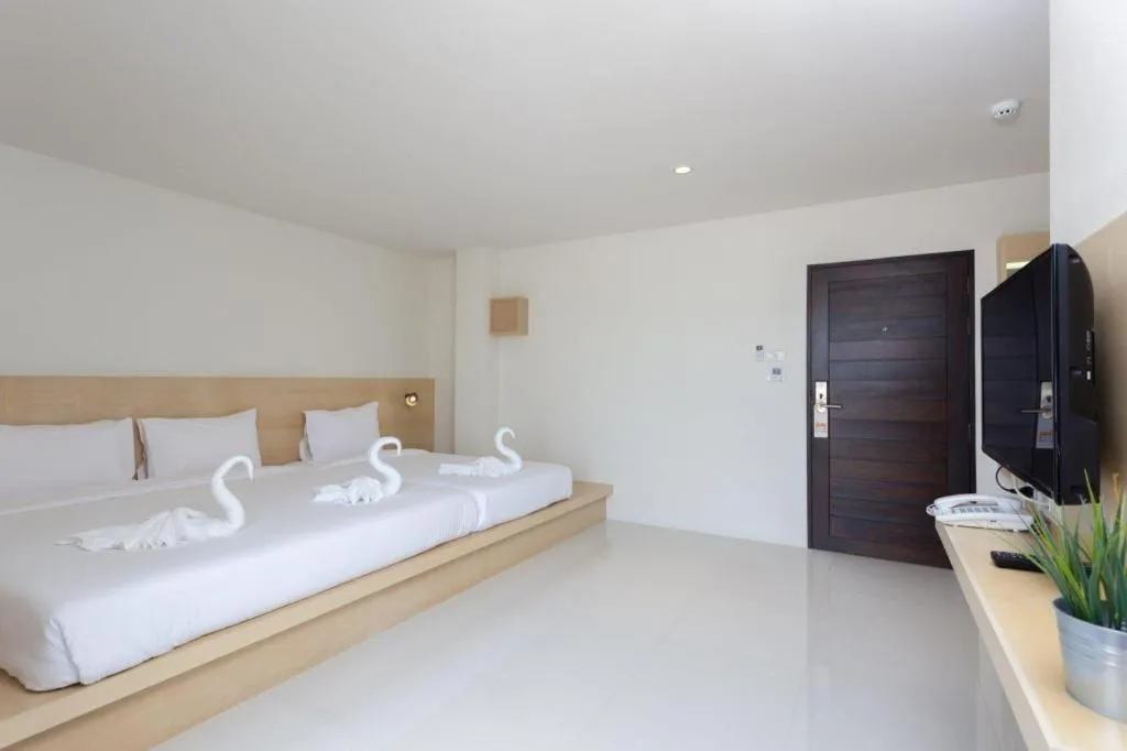 Bed in Le Park Hotel