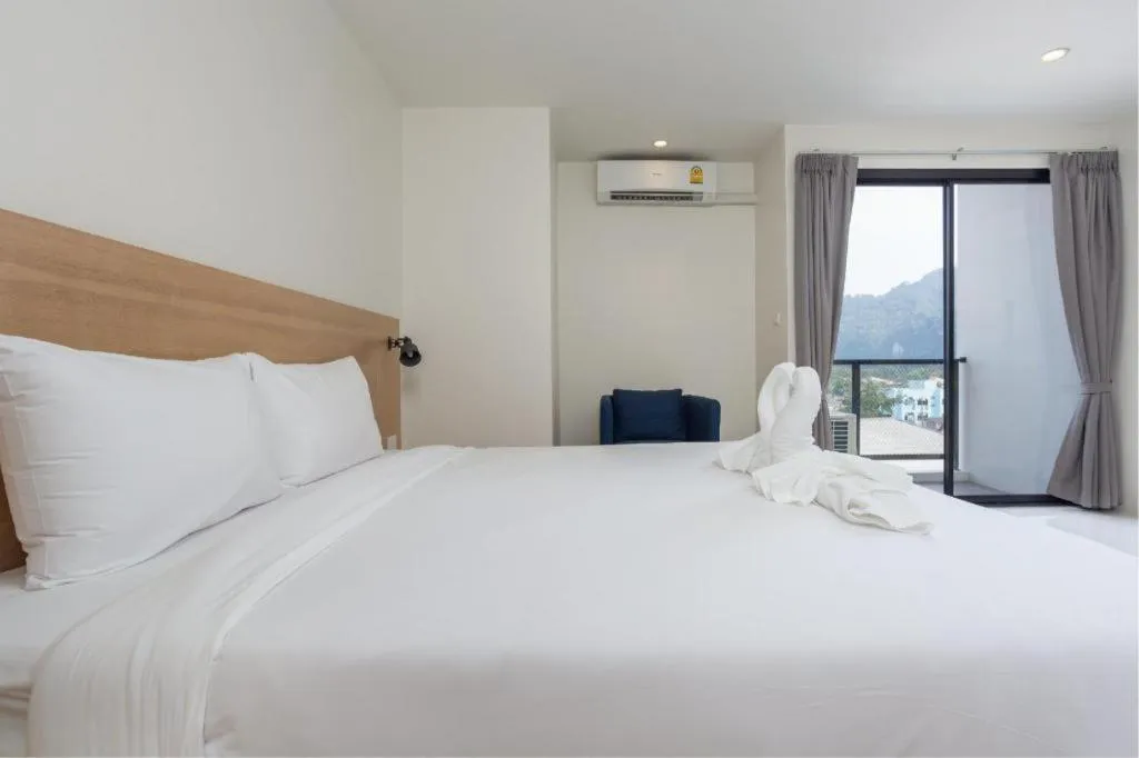 Bed in Le Park Hotel