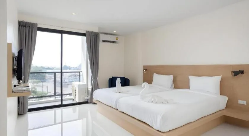 Bed in Le Park Hotel