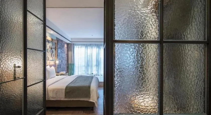 Bed in Hangzhou Cosy Park Hotel