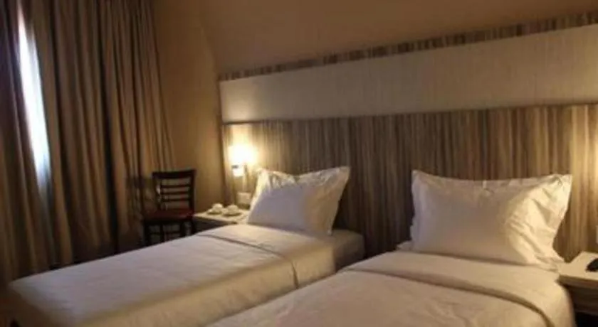 Bed in The Golden Bay Hotel Batam