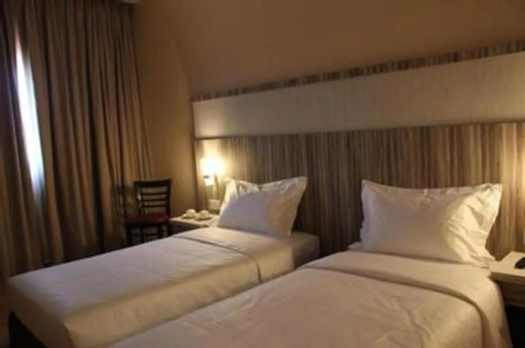 Bed in The Golden Bay Hotel Batam