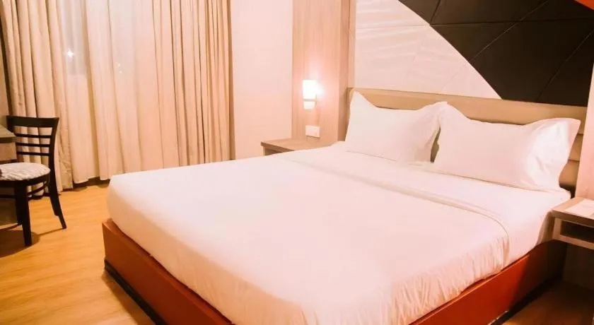 Bed in The Golden Bay Hotel Batam