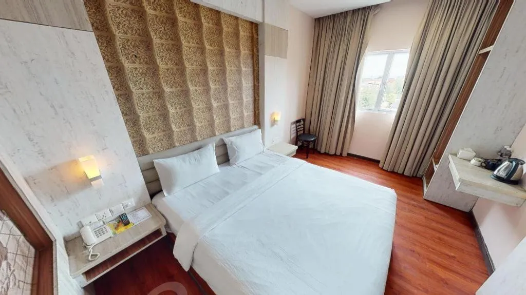 Bed in The Golden Bay Hotel Batam