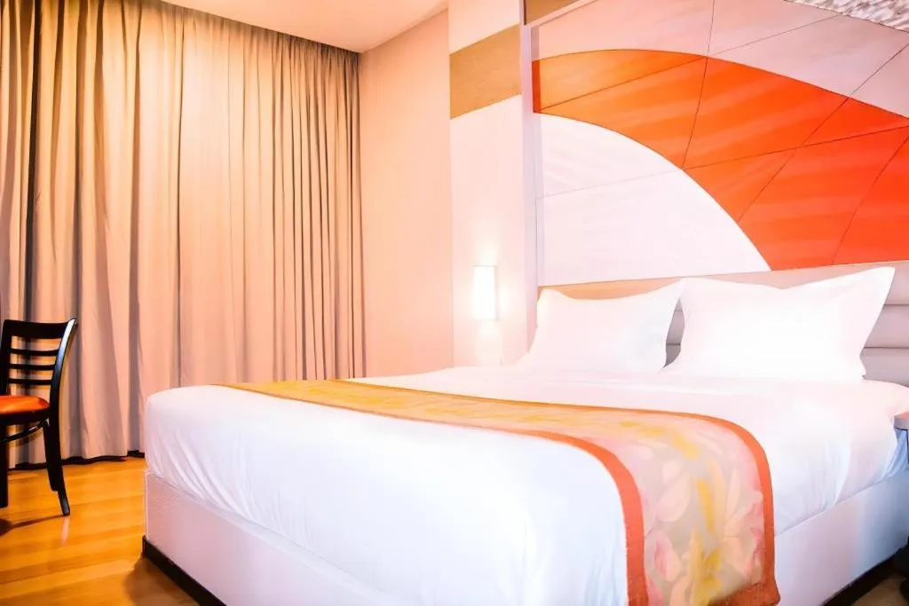 Bed in The Golden Bay Hotel Batam