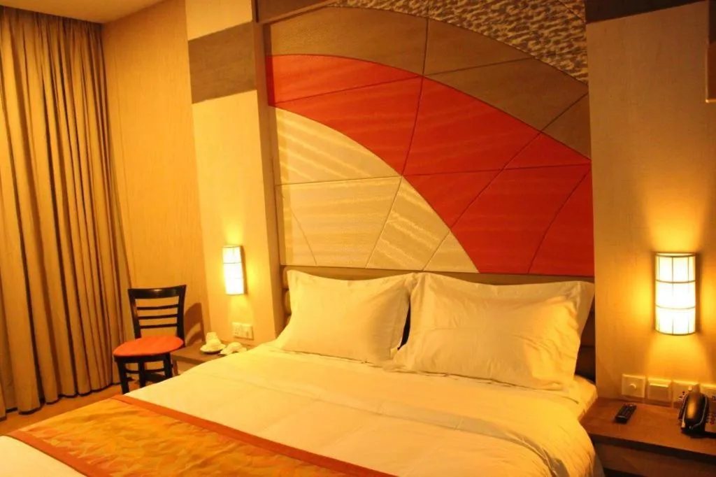 Bed in The Golden Bay Hotel Batam
