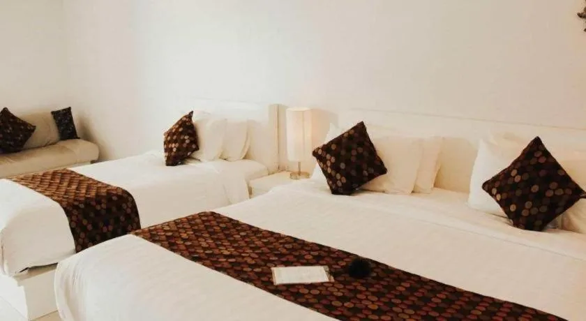 Bed in NanNakara Boutique Hotel