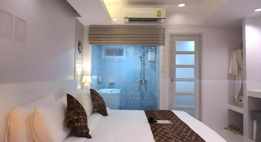 Bed in NanNakara Boutique Hotel