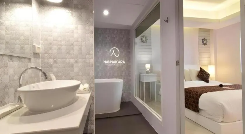 Bed in NanNakara Boutique Hotel