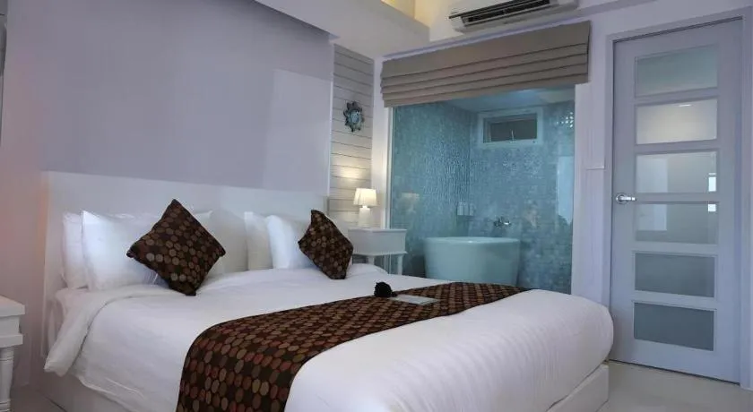 Bed in NanNakara Boutique Hotel