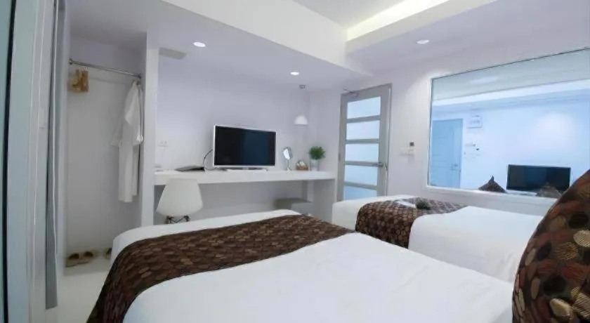 Bed in NanNakara Boutique Hotel