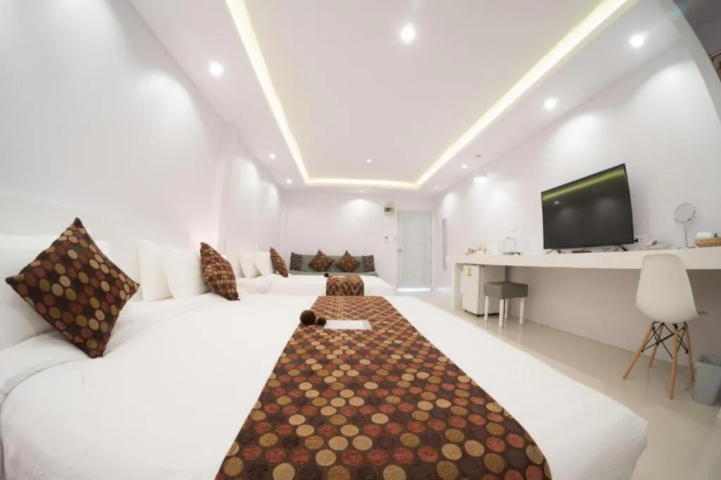 Bed in NanNakara Boutique Hotel