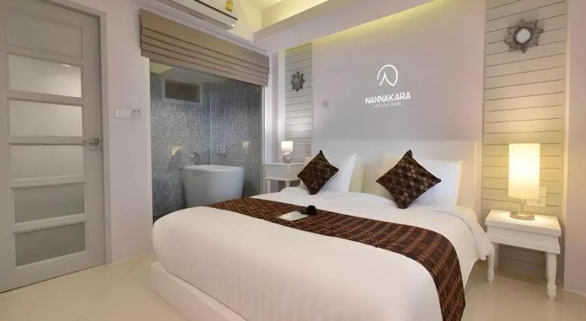 Bed in NanNakara Boutique Hotel