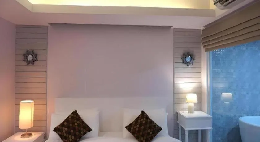 Bed in NanNakara Boutique Hotel