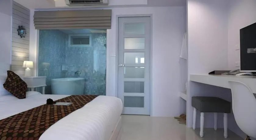 Bed in NanNakara Boutique Hotel