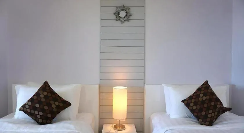 Bed in NanNakara Boutique Hotel