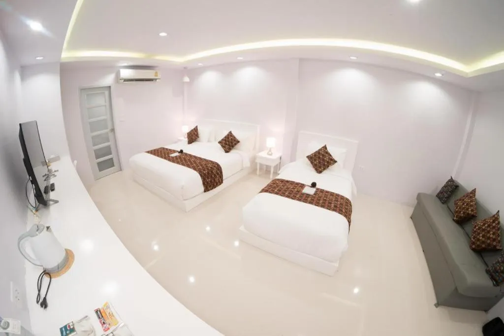 Bed in NanNakara Boutique Hotel