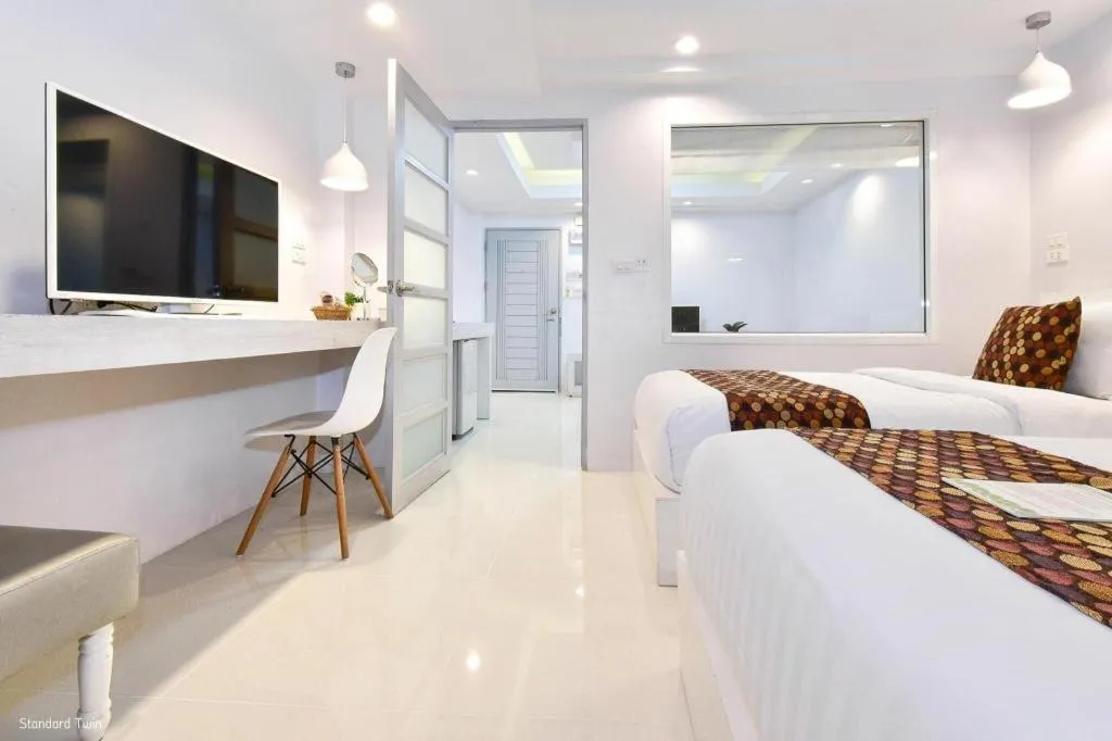 Bed in NanNakara Boutique Hotel