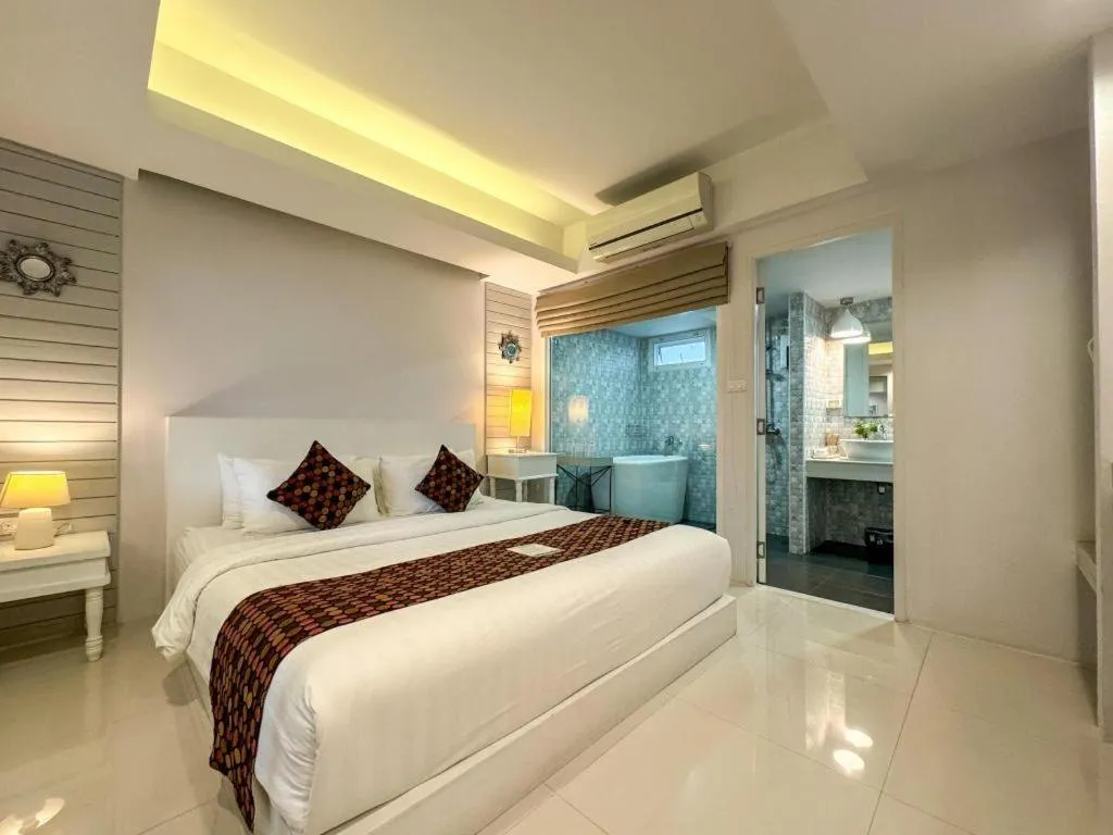 Bed in NanNakara Boutique Hotel