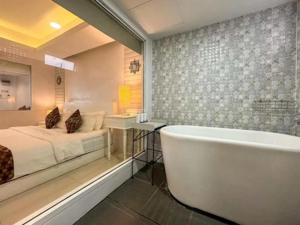 Bed in NanNakara Boutique Hotel