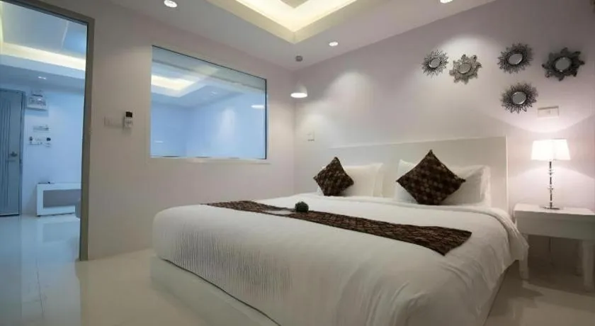 Bed in NanNakara Boutique Hotel