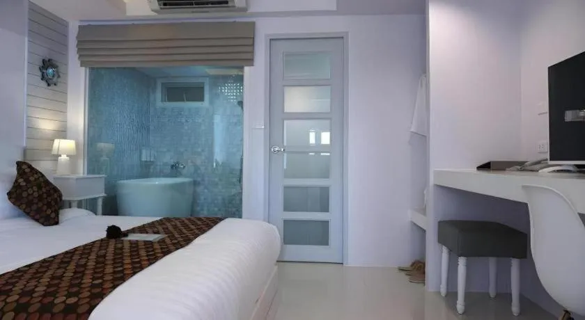 Bed in NanNakara Boutique Hotel