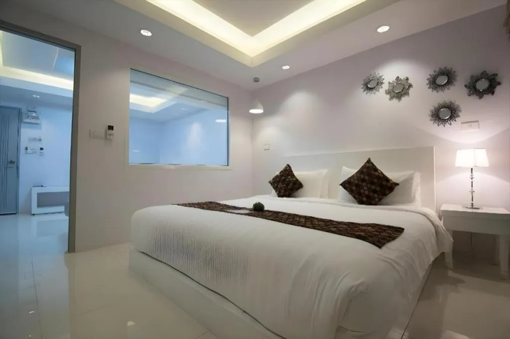 Bed in NanNakara Boutique Hotel