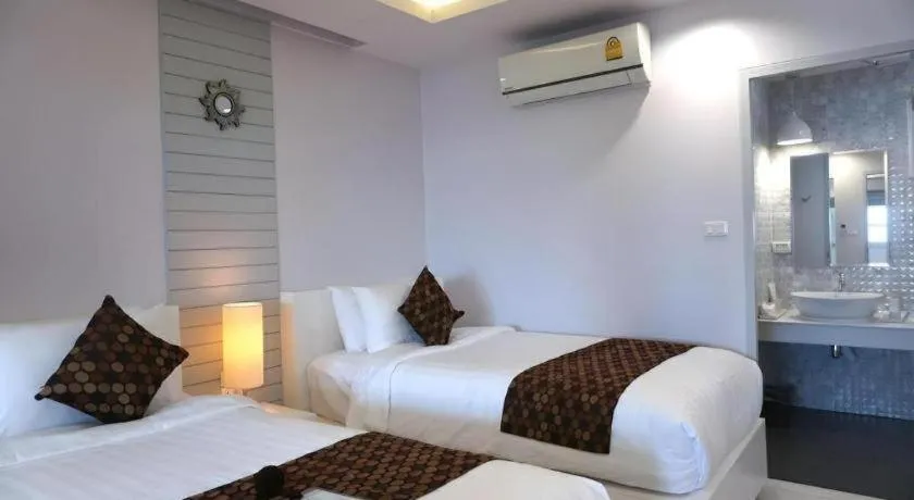 Bed in NanNakara Boutique Hotel