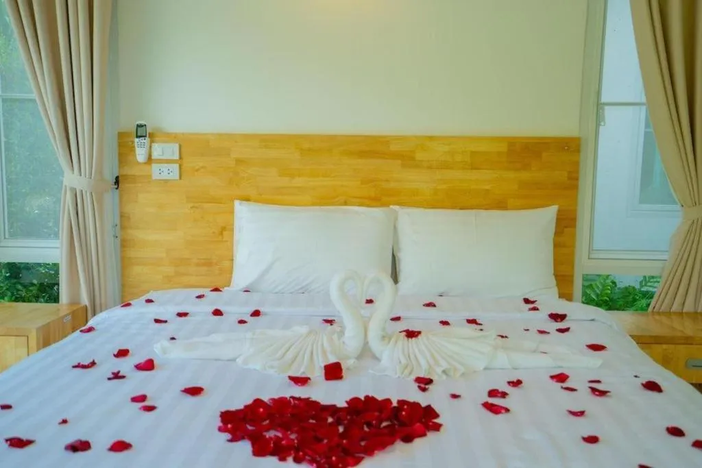 Bed in The White House Boutique Resort