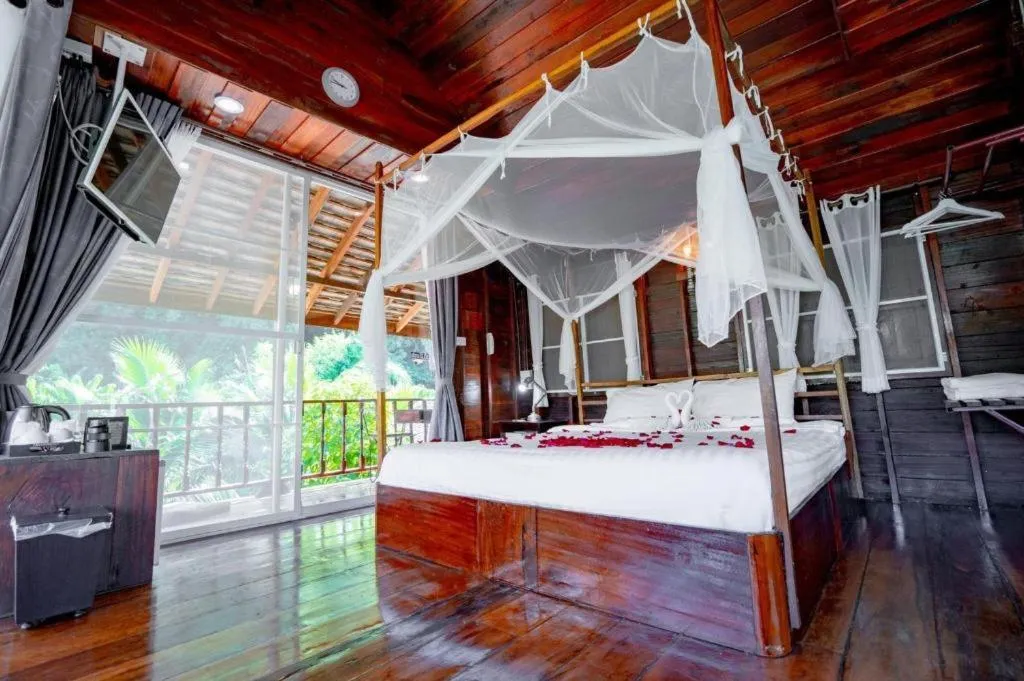 Bed in The White House Boutique Resort