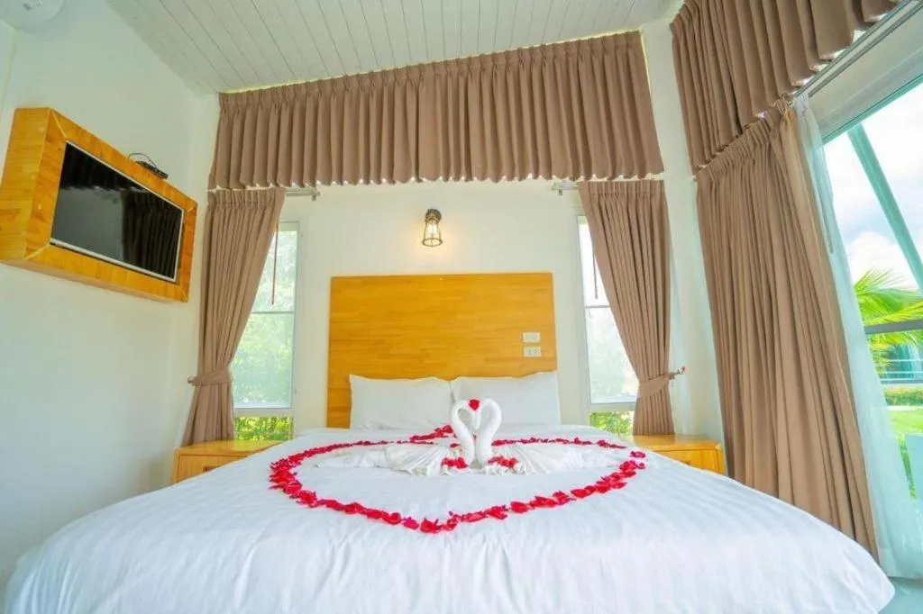 Bed in The White House Boutique Resort