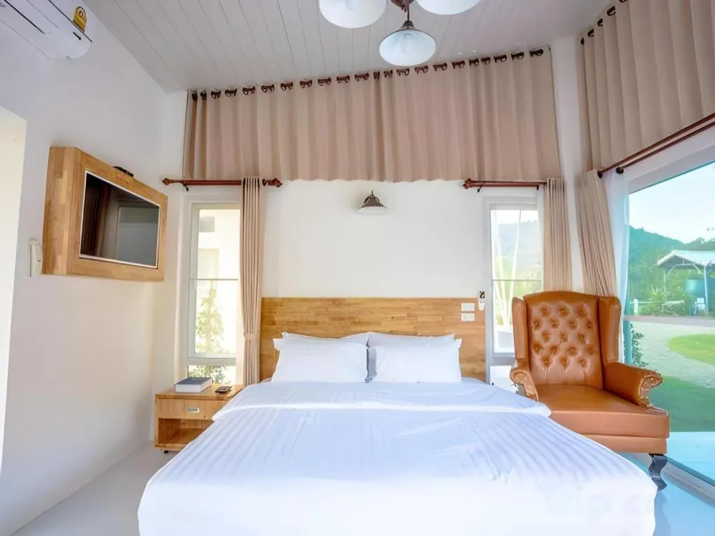 Bed in The White House Boutique Resort