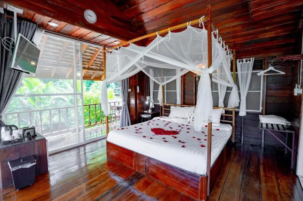 Bed in The White House Boutique Resort