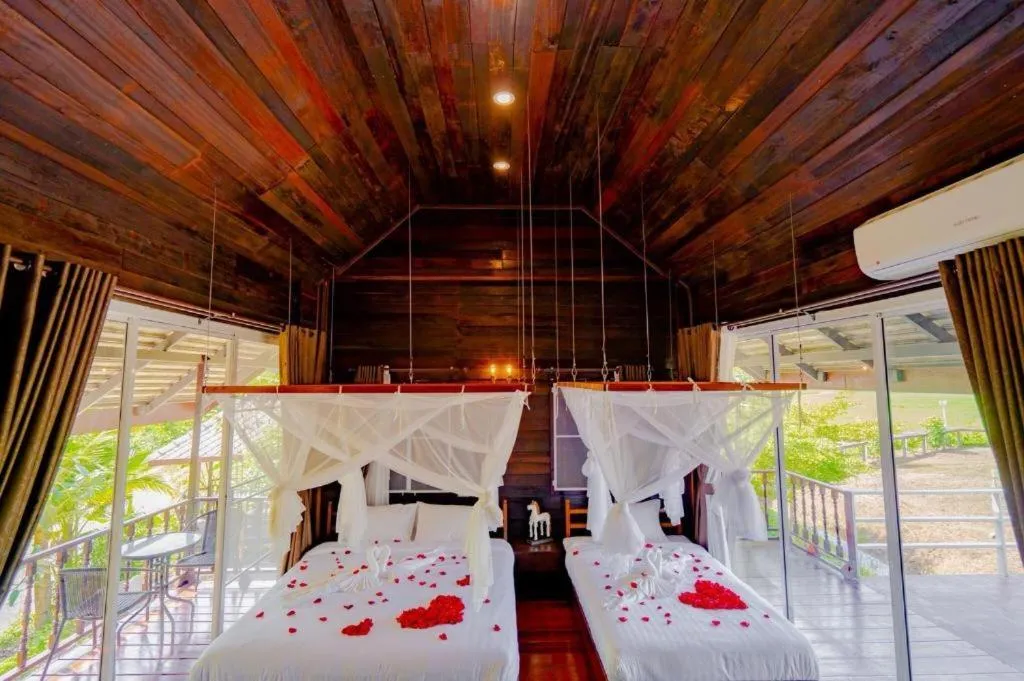 Bed in The White House Boutique Resort